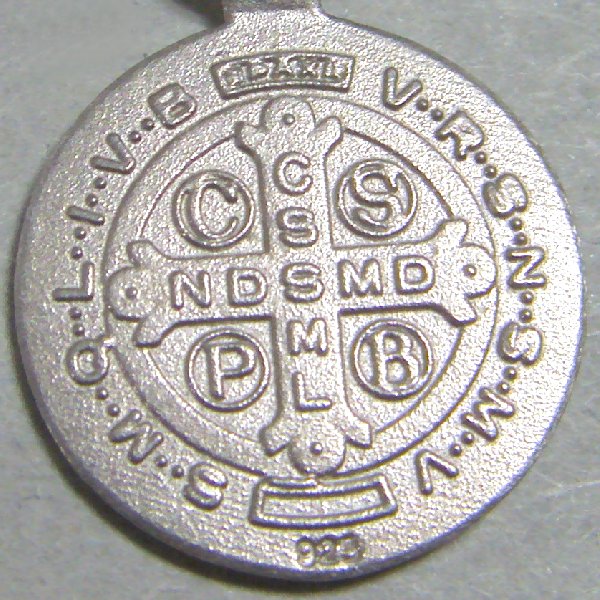 (p1362)Circular silver medal motif San Benito.